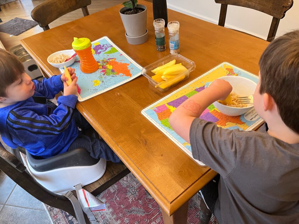 Kids eating mangos and Malagasy cake, learning about Madagascar’s culture